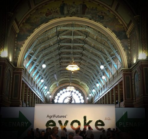 evokeAG 2020 AgriFutures evokeAG sign in the entrance hall of the heritage-listed Royal Exhibition Building in Melbourne, looking up at the vaulted ceiling.
