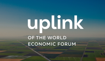 UpLink Water Resilience Challenge – SWAN Systems Named Winner UpLink by the World Economic Forum logo over agricultural landscapes, representing global collaboration on water resilience