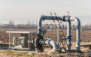Irrigation pump station and pipeline supplying water to a centre pivot system in a dry agricultural field
